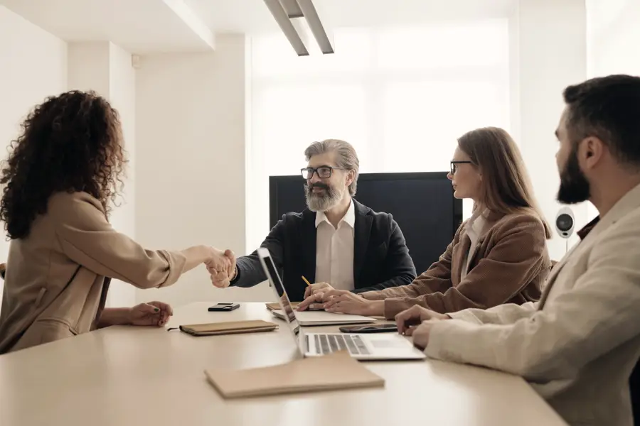 Executives meeting around a boardroom table